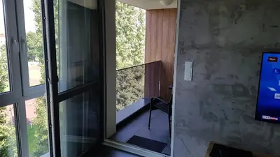 Telewizja i/lub zestaw kina domowego w obiekcie Apartament Marzenie 14 - Opole