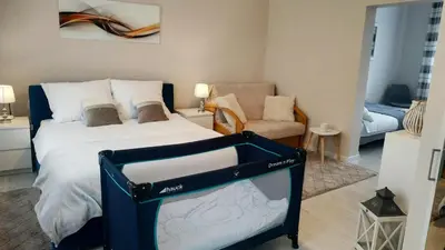 Łóżko lub łóżka w pokoju w obiekcie Apartamenty gościnne na szlaku