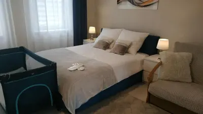 Łóżko lub łóżka w pokoju w obiekcie Apartamenty gościnne na szlaku