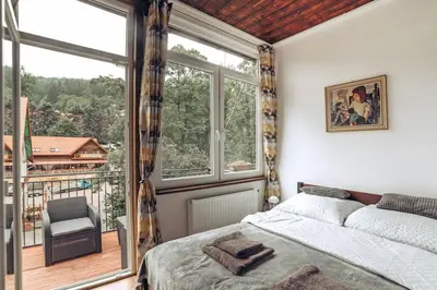 Łóżko lub łóżka w pokoju w obiekcie Duszniki-Zdrój Przytulny Apartament z Tarasem