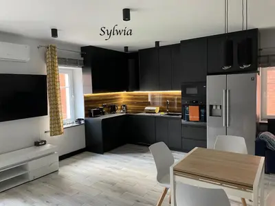 Kuchnia lub aneks kuchenny w obiekcie Słoneczne Apartamenty