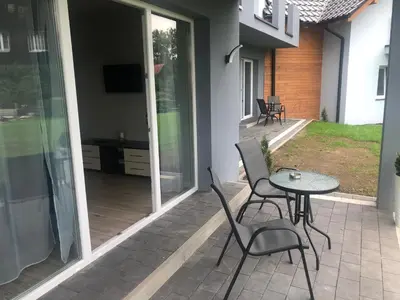 Patio lub wspólna przestrzeń na świeżym powietrzu w obiekcie Apartamenty Antonio 2