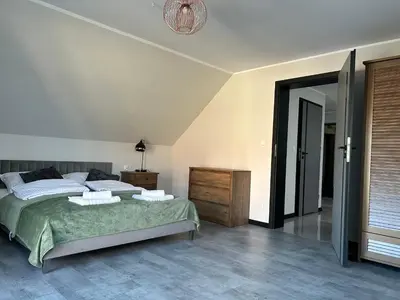 Łóżko lub łóżka w pokoju w obiekcie Apartamenty Antonio 2