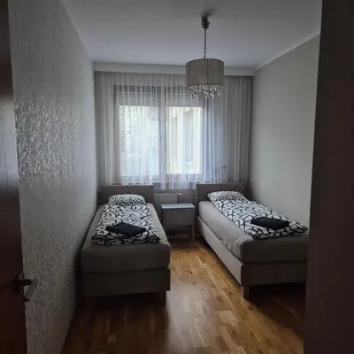 Łóżko lub łóżka w pokoju w obiekcie Apartament Karkonoska z garażem