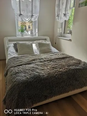 Łóżko lub łóżka w pokoju w obiekcie Apartament Zuza
