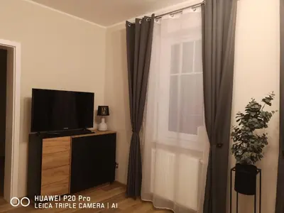 Telewizja i/lub zestaw kina domowego w obiekcie Apartament Zuza