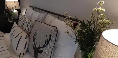 Łóżko lub łóżka w pokoju w obiekcie Apartament Czar-nów
