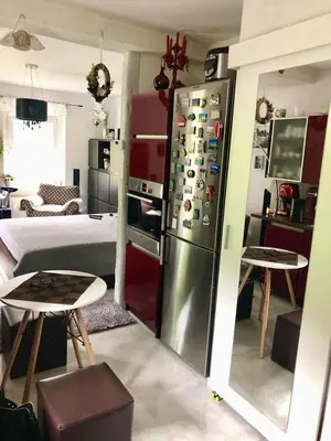 Łóżko lub łóżka w pokoju w obiekcie WYPOSAŻONY apartament przy strumyku w Górach Sowich, Smart TV, Odpocznij w naturze!