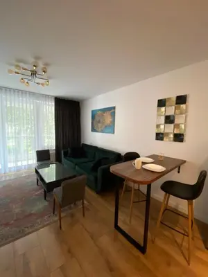 Część wypoczynkowa w obiekcie Green Sofa Apartment