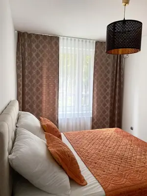 Łóżko lub łóżka w pokoju w obiekcie Green Sofa Apartment