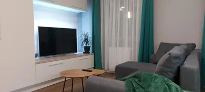 Telewizja i/lub zestaw kina domowego w obiekcie kawalerka na Piastowskim