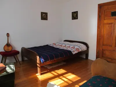 Łóżko lub łóżka w pokoju w obiekcie Chata za Górami