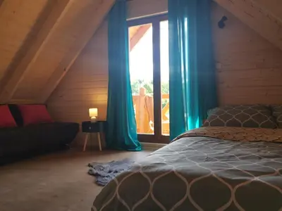 Łóżko lub łóżka w pokoju w obiekcie Domek w Górach Sowich
