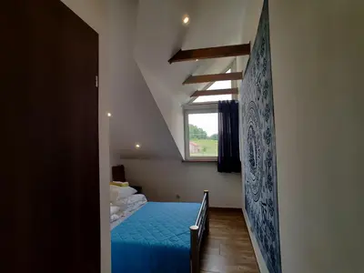 Łóżko lub łóżka w pokoju w obiekcie Ośrodek Agroturystyczny Przystanek Koński Dwór
