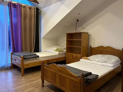 Łóżko lub łóżka w pokoju w obiekcie Ośrodek Agroturystyczny Przystanek Koński Dwór