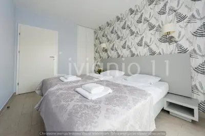Łóżko lub łóżka w pokoju w obiekcie Apartament Czarna Góra Sienna LIV