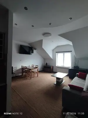 Telewizja i/lub zestaw kina domowego w obiekcie APARTAMENT W CENTRUM OLESNA