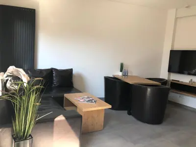 Telewizja i/lub zestaw kina domowego w obiekcie Apartamenty Dworcowa 45