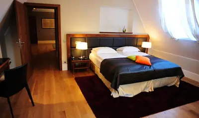 Łóżko lub łóżka w pokoju w obiekcie Hotel Zamek Lubliniec