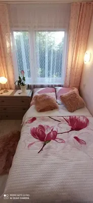 Łóżko lub łóżka w pokoju w obiekcie Magdalenka