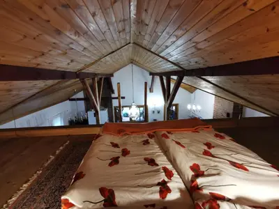 Łóżko lub łóżka w pokoju w obiekcie Agroturystyka Sielanka nad Stawem