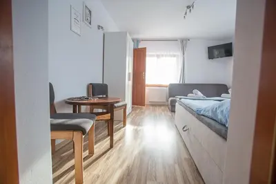 Łóżko lub łóżka w pokoju w obiekcie Nad Cedronem