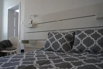 Łóżko lub łóżka w pokoju w obiekcie Apartament Gliwice Centrum Witkiewicza I