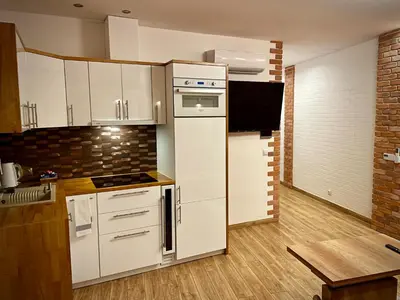 Kuchnia lub aneks kuchenny w obiekcie Apartamenty Grodowa 2
