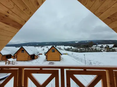 Obiekt Osada Orlica klimatyczne domki z widokiem na góry i termalnym SPA sauna jacuzzi 4 km od Zieleniec Ski Arena zimą