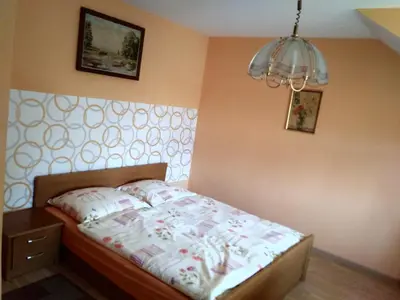 Łóżko lub łóżka w pokoju w obiekcie Agroturystyka Nad Cichą