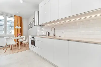 Kuchnia lub aneks kuchenny w obiekcie Elegant Apartments Gwiaździsta with FREE GARAGE Wrocław by Noclegi Renters