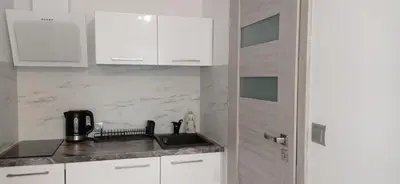 Kuchnia lub aneks kuchenny w obiekcie Wypoczynek Pod Lasem