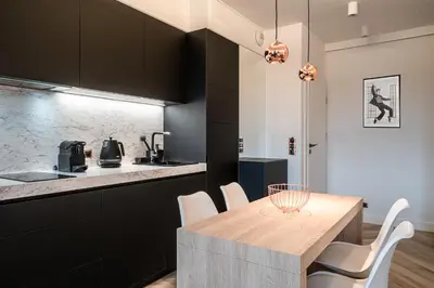 Kuchnia lub aneks kuchenny w obiekcie RentPlanet - Apartamenty Jagiełły