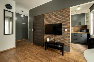 Telewizja i/lub zestaw kina domowego w obiekcie RentPlanet - Apartamenty Jagiełły
