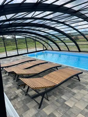 Basen w obiekcie Leśny Zakątek Uroczysko - Domek z Balią lub w pobliżu
