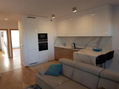 Kuchnia lub aneks kuchenny w obiekcie River Deluxe Atal Towers Apartment