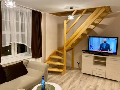 Telewizja i/lub zestaw kina domowego w obiekcie Apartamenty W Brzozowym Gaju