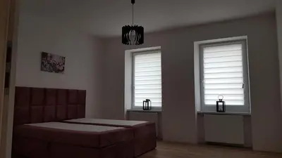Łóżko lub łóżka w pokoju w obiekcie Avalon apart 1