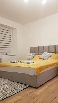 Łóżko lub łóżka w pokoju w obiekcie Avalon apart 1