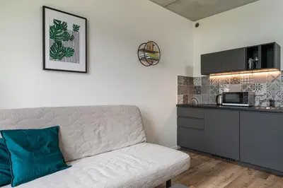 Kuchnia lub aneks kuchenny w obiekcie RentPlanet - Apartamenty Zarembowicza II