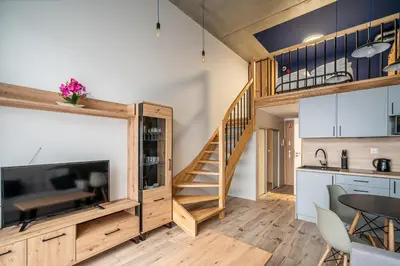 Kuchnia lub aneks kuchenny w obiekcie RentPlanet - Apartamenty Zarembowicza II