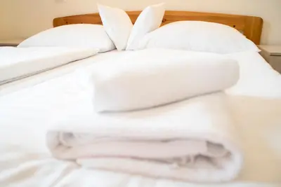 Łóżko lub łóżka w pokoju w obiekcie Willa Brygida Spa