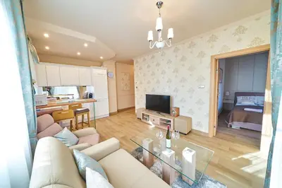 Telewizja i/lub zestaw kina domowego w obiekcie LAGUNA Apartament 9 Willa Ogrodowa