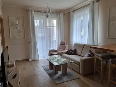 Telewizja i/lub zestaw kina domowego w obiekcie LAGUNA Apartament 9 Willa Ogrodowa