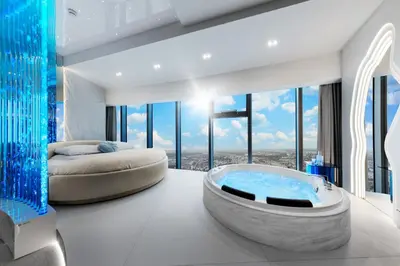 Łóżko lub łóżka w pokoju w obiekcie Apartamenty z Jacuzzi w Sky Tower