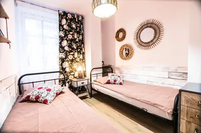 Łóżko lub łóżka w pokoju w obiekcie AP Apartment's W Rynku