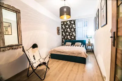 Łóżko lub łóżka w pokoju w obiekcie AP Apartment's W Rynku