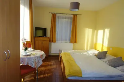 Łóżko lub łóżka w pokoju w obiekcie Apartamenty u Ani