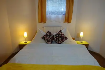 Łóżko lub łóżka w pokoju w obiekcie Apartamenty u Ani