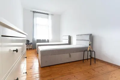 Łóżko lub łóżka w pokoju w obiekcie Avalon apart 2